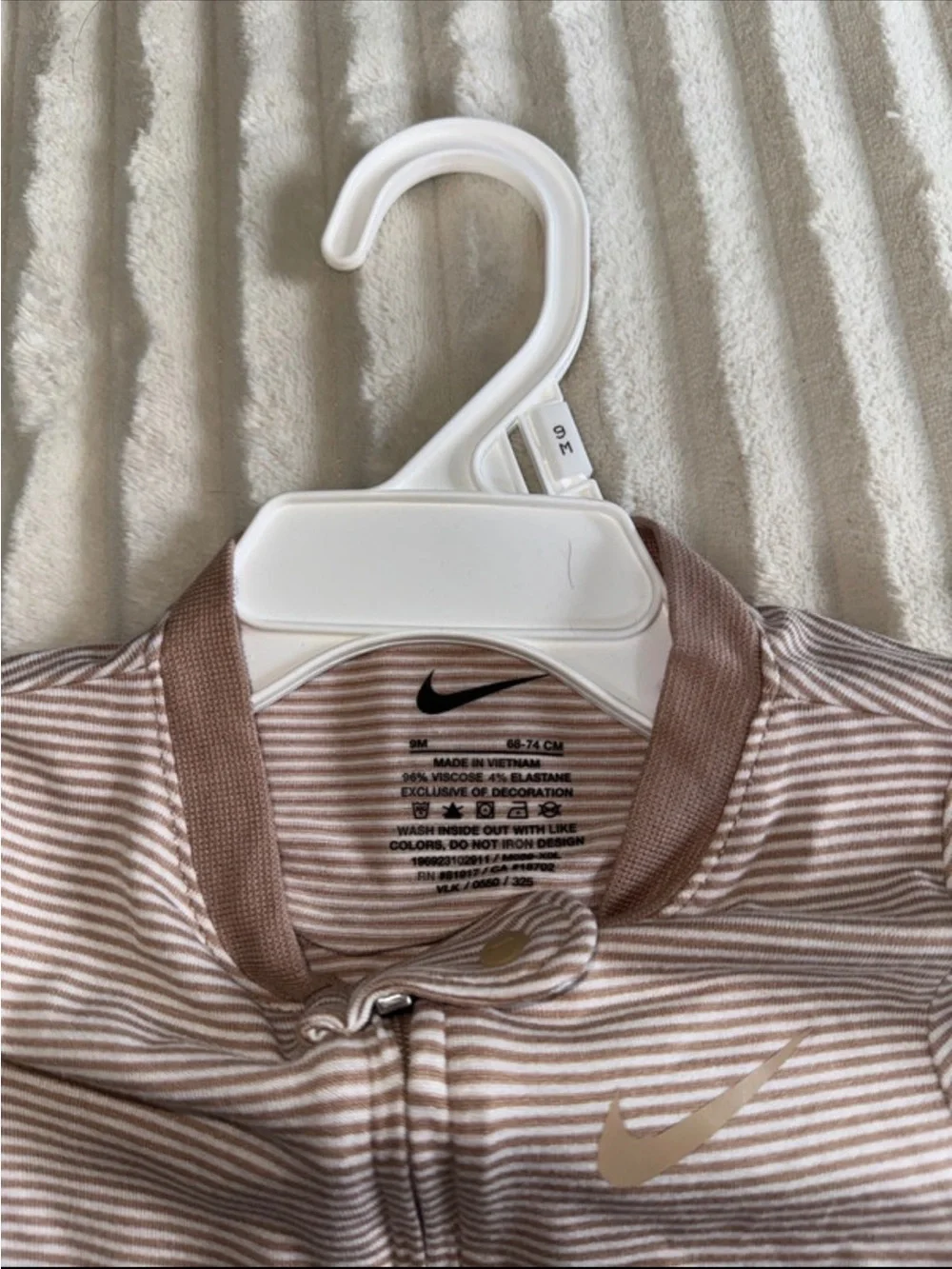 Nike Striped Zip Footed One-Piece in Beige and White